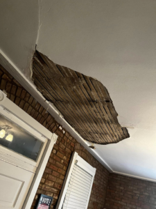 A damaged ceiling with exposed lath, showing a repair project by Better Than Your Last Handyman in St. Charles, MO.