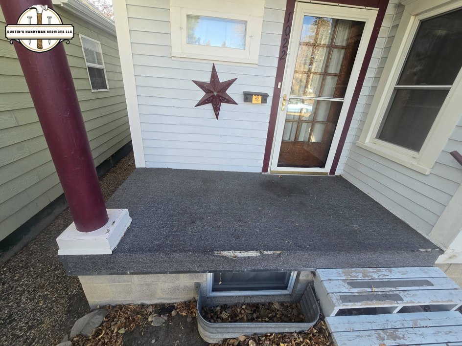 A damaged porch needing repair before handyman services by Dustin's Handyman Services LLC in Great Falls, MT.