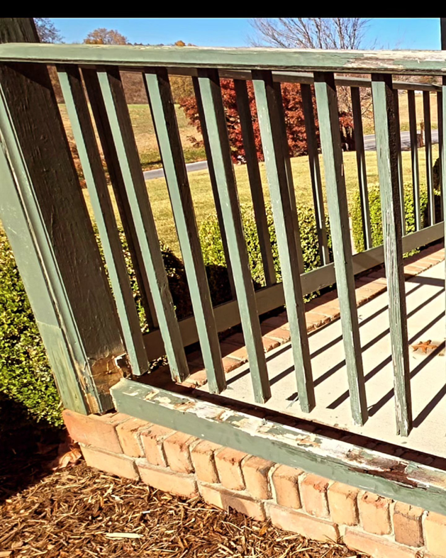 A damaged porch railing with peeling paint, showing a project before repair by DEMIA 17 & Company LLC in Waldorf, MD.
