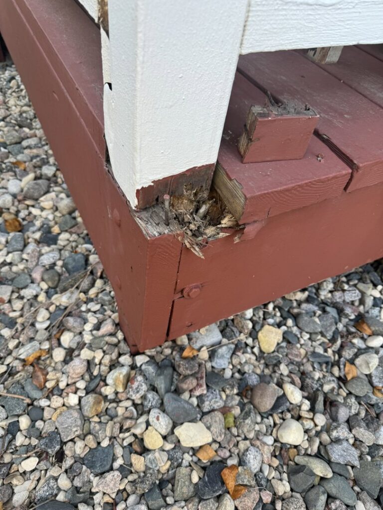 Damaged porch railing and post requiring repair by Midwest Handyman LLC in West Fargo, ND.
