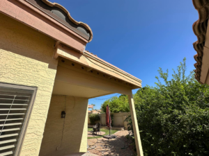 Damaged soffit and fascia on a house exterior needing repair by Basevi Home Repair LLC in Gilbert, AZ