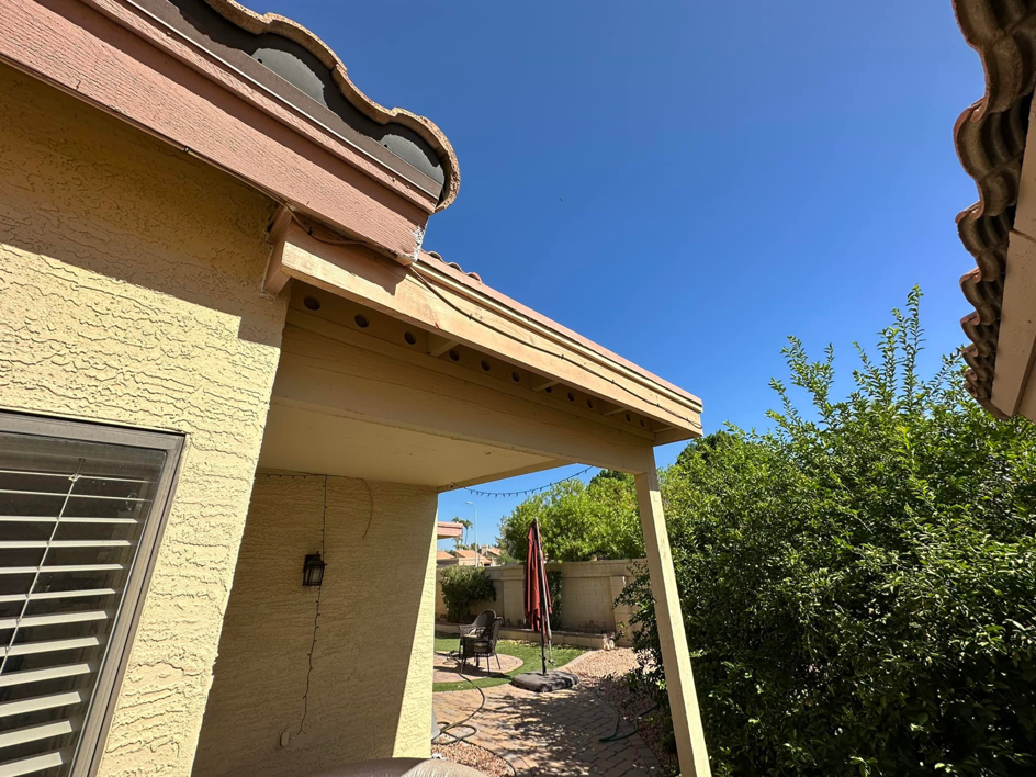 Damaged soffit and fascia on a house exterior needing repair by Basevi Home Repair LLC in Gilbert, AZ
