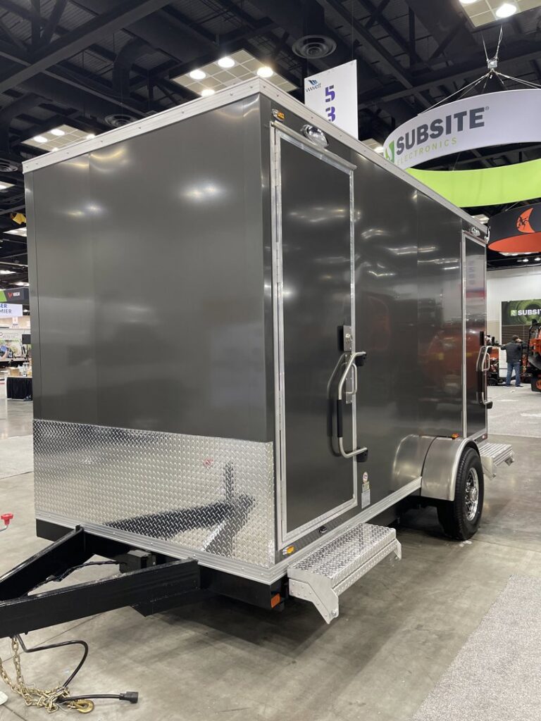 Exterior of a dark grey custom-built trailer by Comforts of Home Services Inc, a general contractor in Aurora, IL.