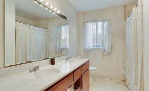 A dated bathroom ready for a complete remodel by Imagine Construction & Home Remodeling in Lexington, KY.