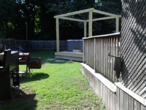 Wooden framing for a new deck and hot tub installation by The Home Pros in Carson, CA.