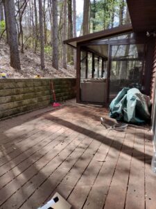 A wooden deck cleared of a broken hot tub after junk removal service by One Call Junk Removal in Minneapolis, MN