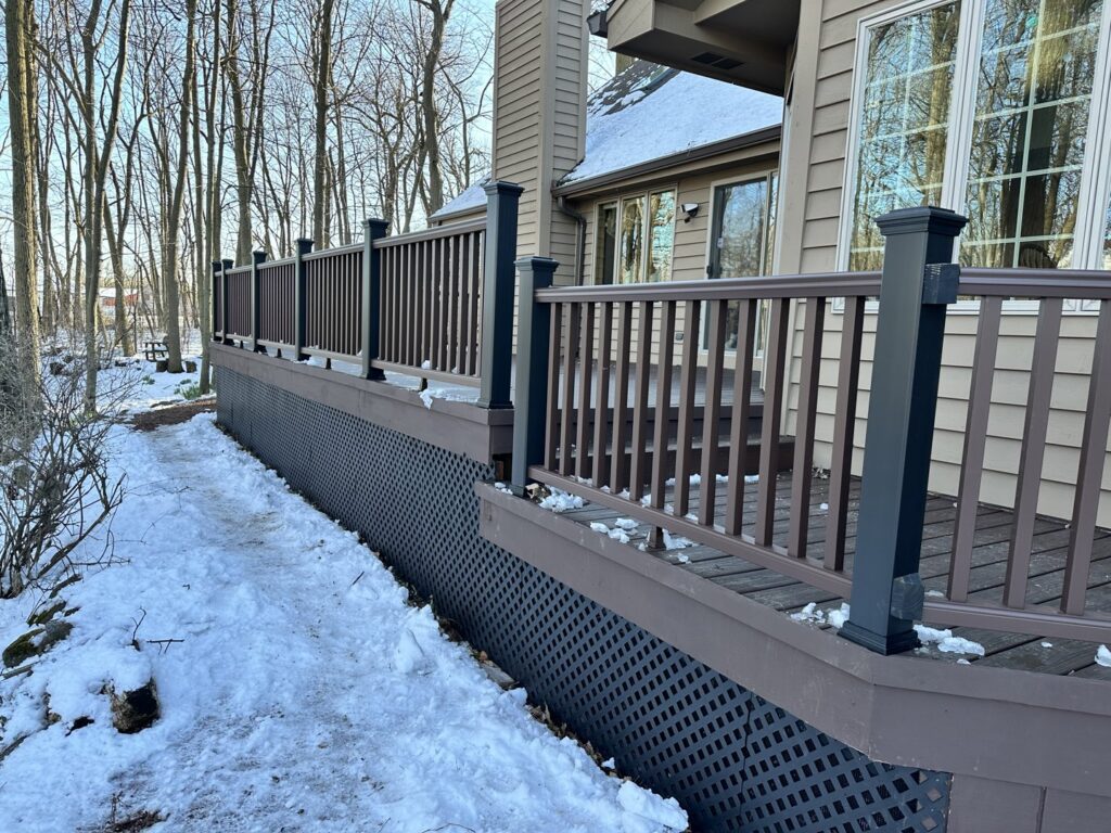 New deck construction featuring decorative lattice skirting by Top Notch Contracting in Racine, WI.