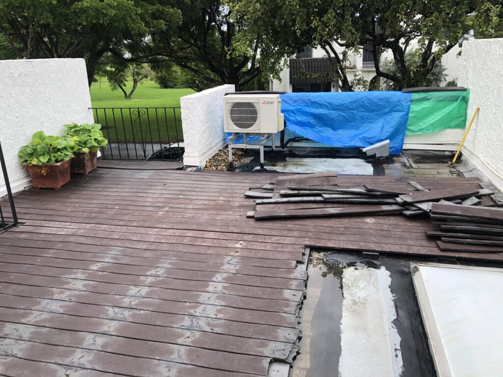 Debris from a deck demolition project ready for removal by Gator Junk Removal in Miami, FL.