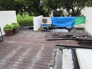Debris from a deck demolition project ready for removal by Gator Junk Removal in Miami, FL.