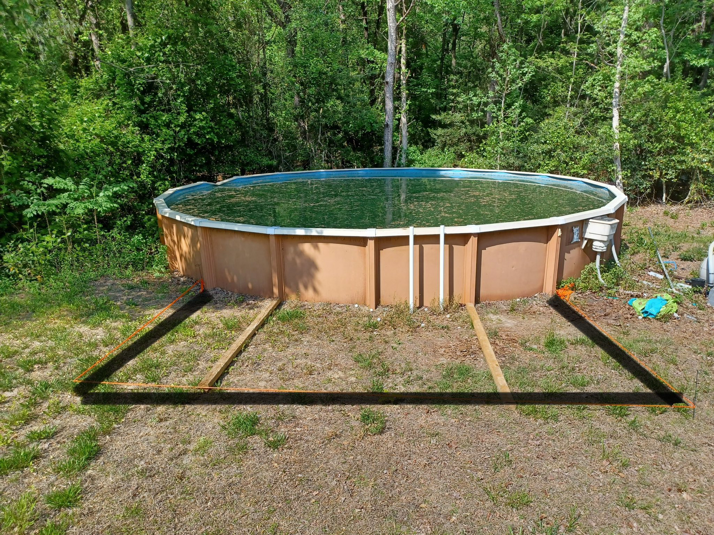 Wooden framing laid out for a new deck around an above-ground pool by Donald Home Improvements, llc in Milford, DE.
