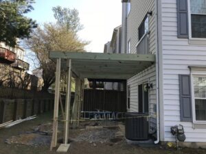 The framing of a new deck being installed, a construction project by Artstone Exteriors & Renovations in Myersville, MD.