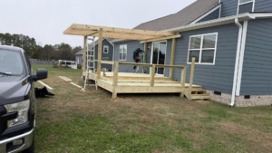 Deck and pergola construction in progress at a home, provided by M&M Handyman Services LLC in Clarksville, TN.
