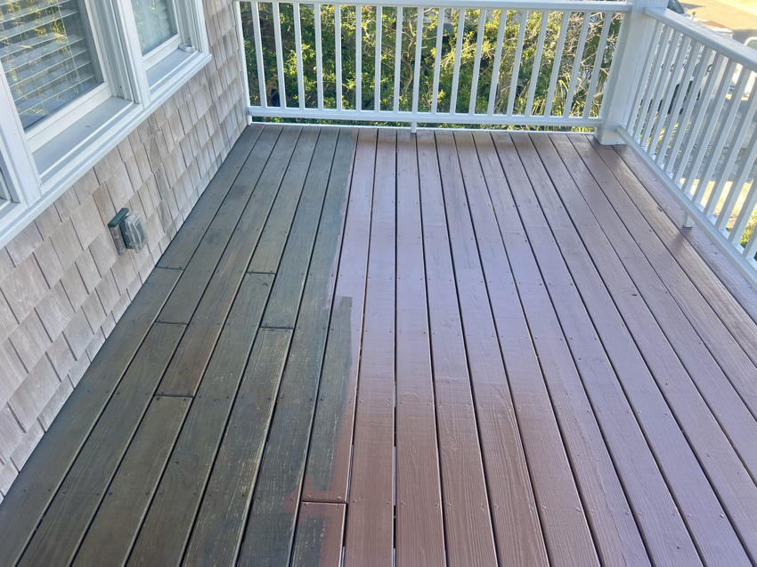 Deck staining and renovation in progress by Wolff Renovation in Wilmington, NC.