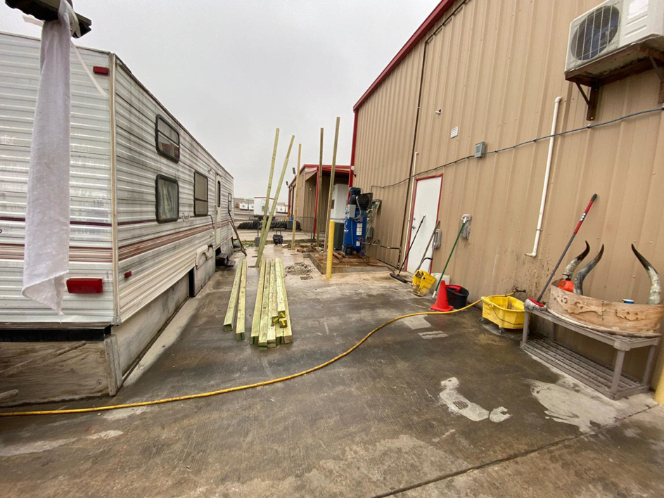 Initial foundation posts for a new deck and stairs by JP Construction in San Antonio, TX.