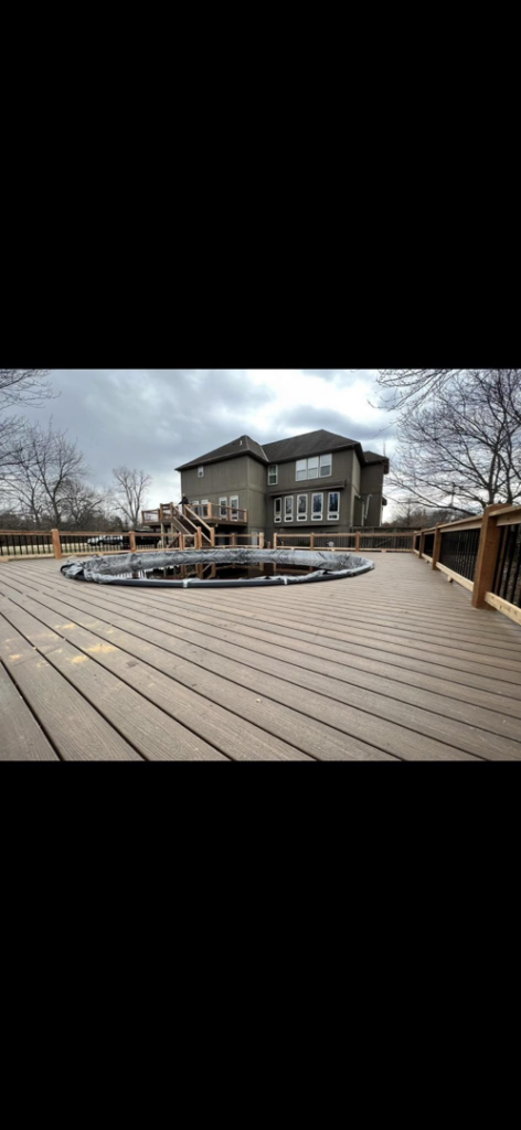 Detailed view of the deck surface and seamless pool integration by Chad Fry the Deck Guy LLC in Blue Springs, MO.