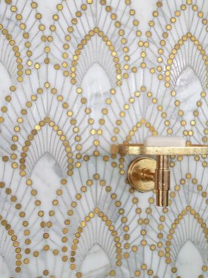 Close-up of decorative bathroom wall tiles and a newly installed wall-mounted soap dish by Husband for Hire in Suffolk, VA.