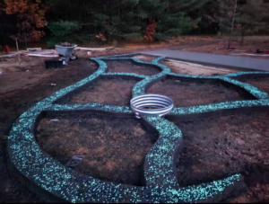 A decorative concrete pathway with glowing aggregate installed by Cervantes Concrete Llc in Caledonia, WI.