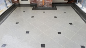 A newly installed decorative patterned patio floor coating by Titan Exteriors in Hillsboro, OR.