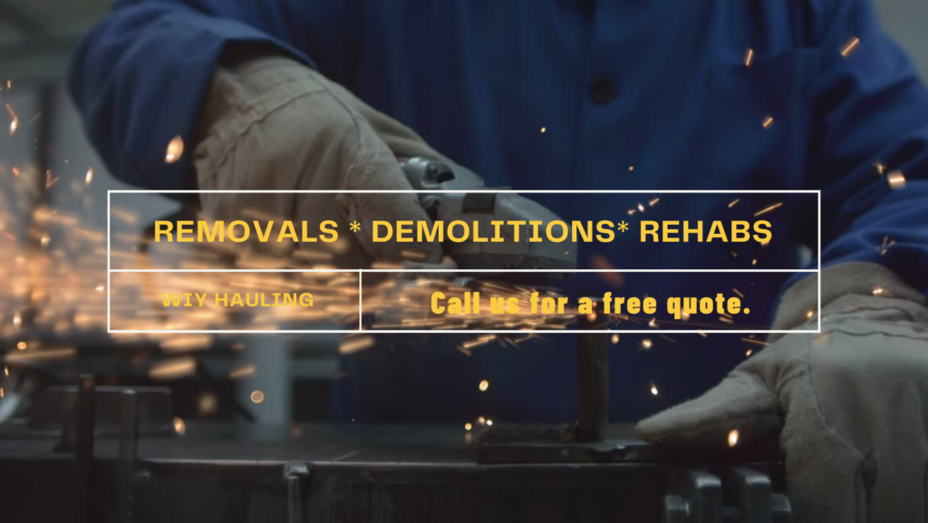 A worker performing demolition or renovation work with an angle grinder for WIY Hauling and Junk removal LLC in Milwaukee, WI.