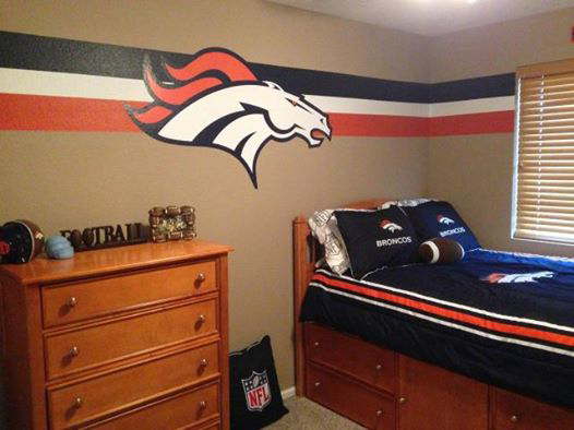 A professionally painted Denver Broncos themed bedroom by Cali Painting in Fort Collins, CO