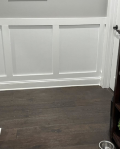 Close-up of expertly installed wainscoting and baseboard by Handy Dad's in Seminole, FL