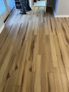Detailed view of new wood plank flooring installation, a quality service by Hill Renovations LLC in Athens, GA