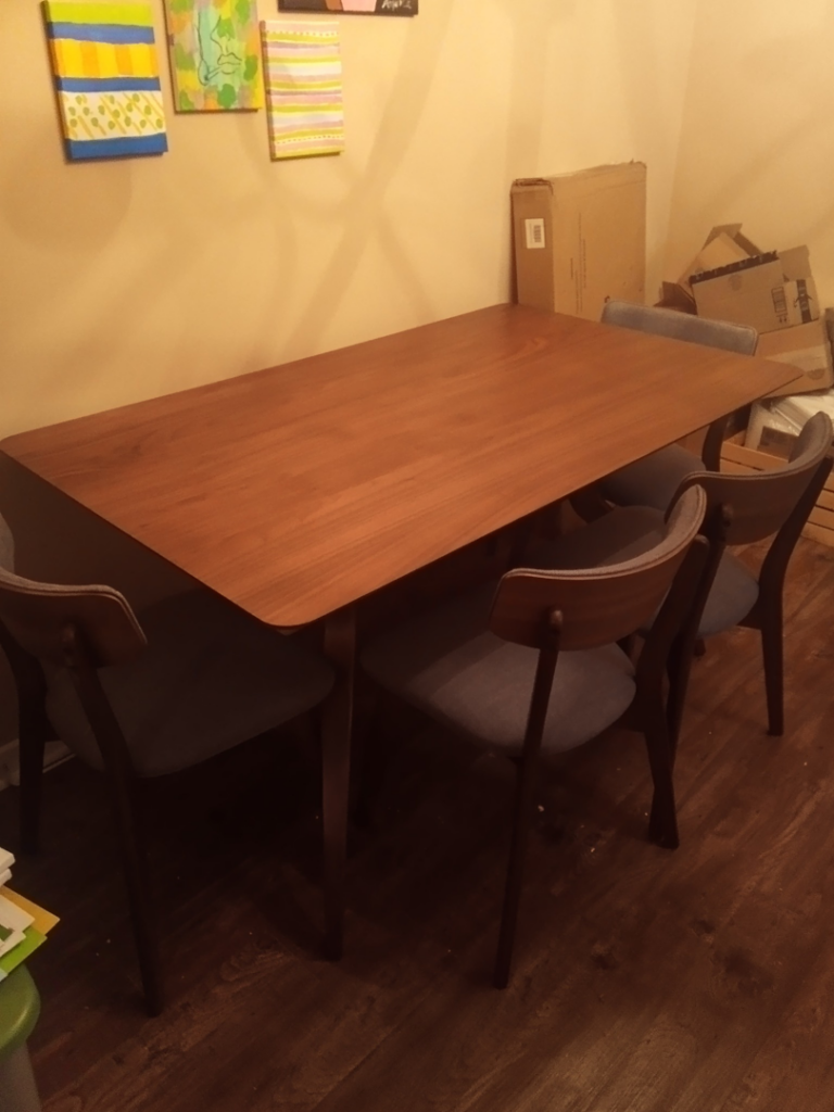 Dining table and chair assembly, part of comprehensive furniture setup services by Berryhill Handyman and Home Preservation in Jonesboro, AR.