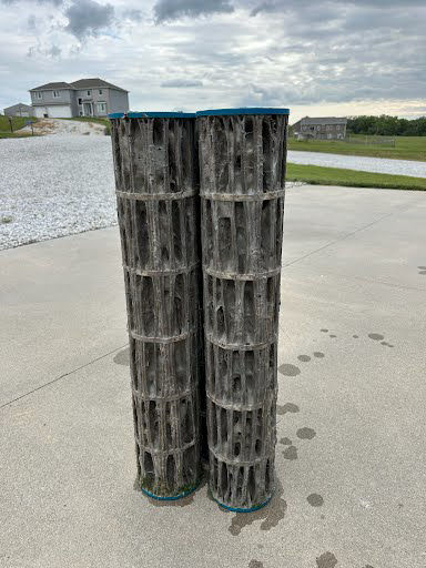 Dirty pool filter cartridges removed for cleaning or replacement by Titan Handyman, LLC in Lewes, DE.