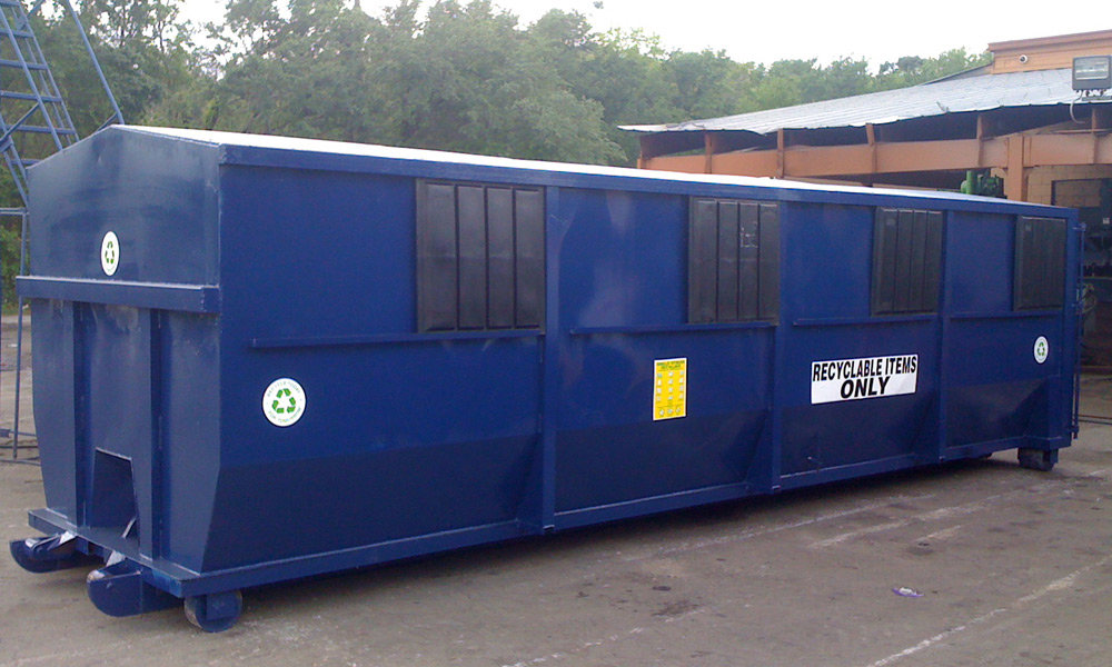A large blue recycling dumpster container for general junk removal and recycling by Disposall in Orlando, FL.
