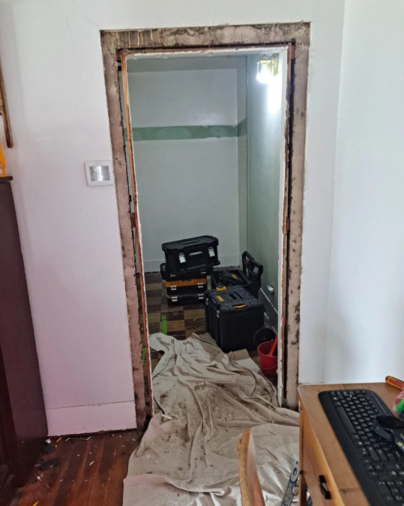 A doorway with the frame removed, showing demolition work during a renovation project by Honey Don'ts Handyman Service in Twin Falls, ID.