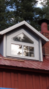 Close-up of a dormer window installation or repair by Handyman Heroes, enhancing homes in Roswell, NM.