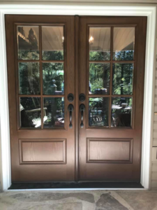 Newly installed double brown entry doors with multiple glass panels by The Window & Door Gallery in Elizabethtown, KY.