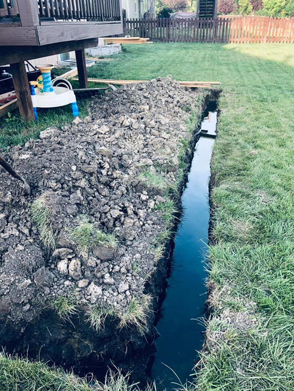 Drainage trench excavation and installation services by SLR Contracting in Chester, NY