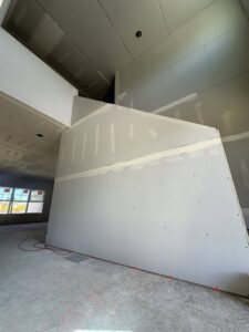 Drywall construction in progress, including a large architectural feature, by Hahn Brothers Drywall Co Inc in Evansville, IN