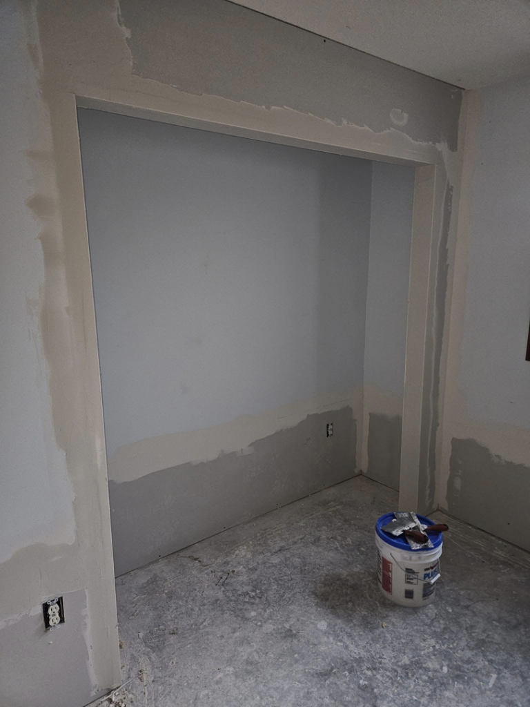 A room with completed drywall mudding and finishing, ready for painting by Tim's handyman service in Cherry Hill, NJ.