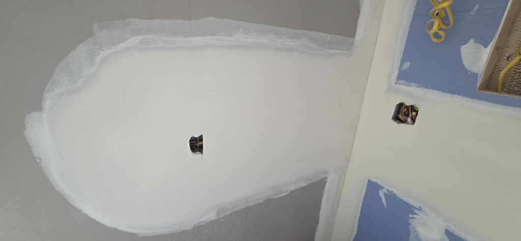 Drywall finishing and mudding on a curved wall section by AJ's Drywall & Finishing, LLC in St. Louis, MO.