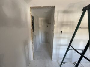 Drywall installation in a hallway or closet area by BK's Handyman Services in Carlton, OR.