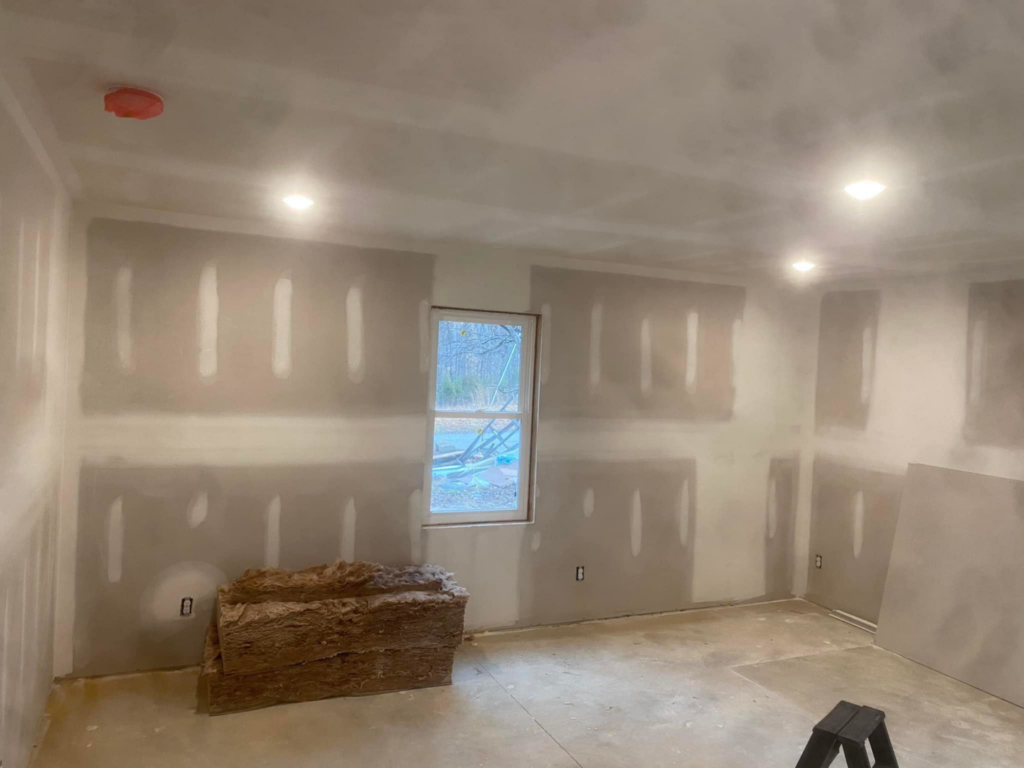 Drywall installation with insulation and recessed lighting in a room by R&R Foundation and remodeling in Owensboro, KY
