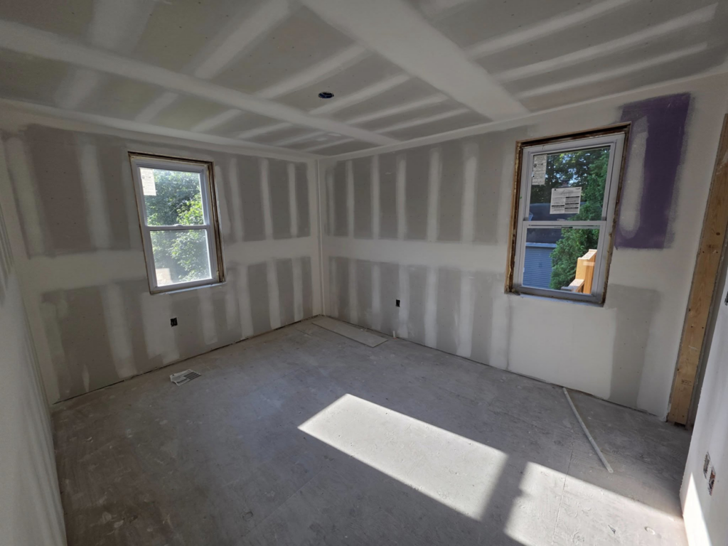 Drywall installation and room remodeling in progress by J M Construction & Remodeling in Humble, TX.