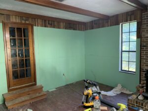 Drywall installation in a room renovation by Wall Doctor's Plastering LLC in Tallahassee, FL