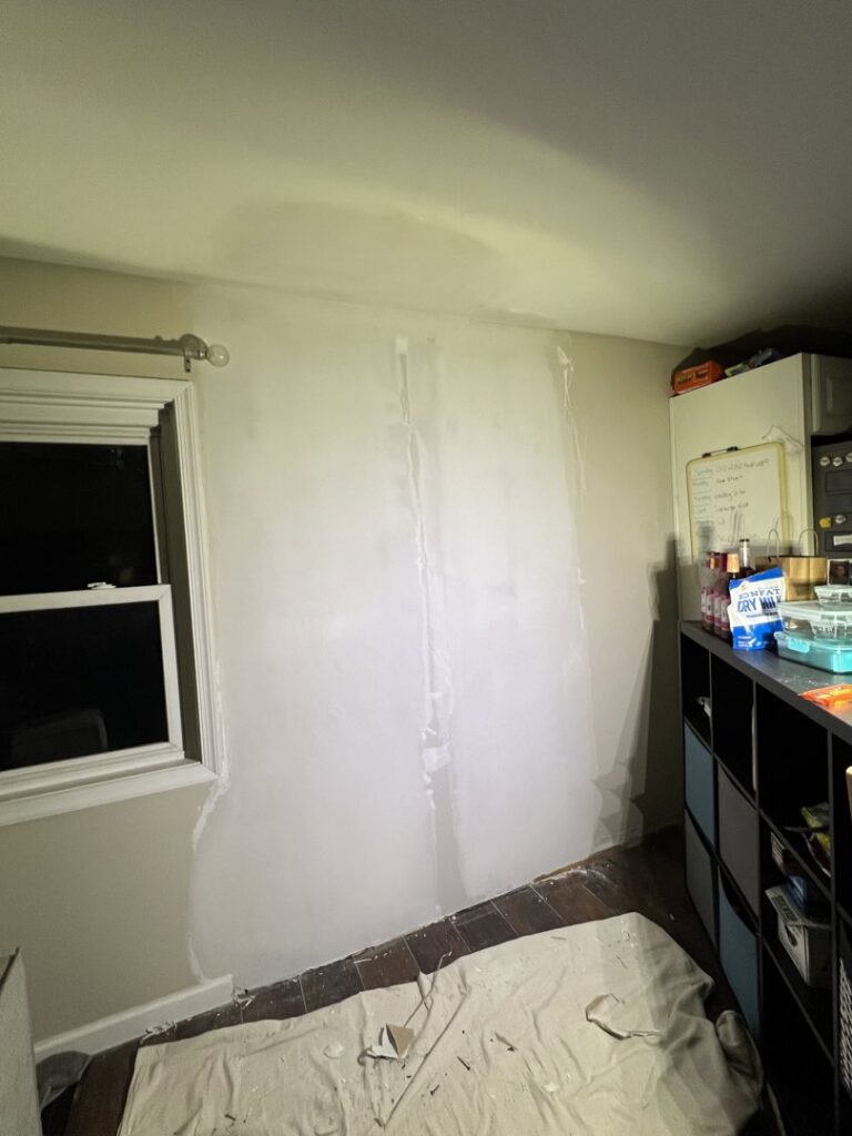 A wall with fresh drywall mudding and plastering, showing seams being finished by N. Bennecoff Drywall & Plaster in Lancaster, PA.