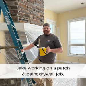 Jake from Odd Job Larry working on a drywall patch and paint job inside a home in Kenosha, WI.