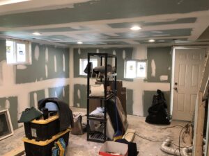 Room with new drywall and recessed lighting installed in the ceiling by AES Electrical Contractor in Richmond, VA.