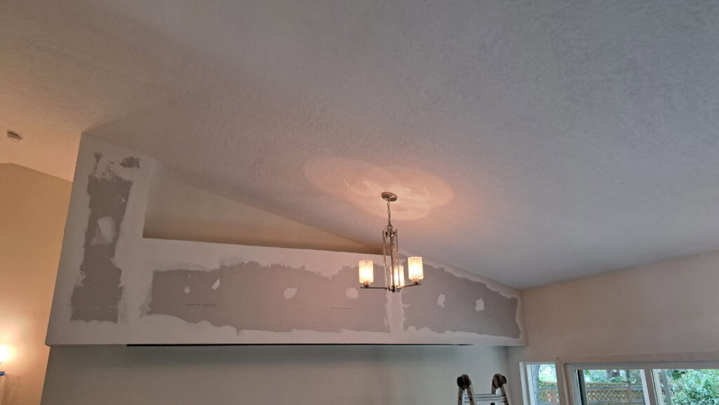 Interior wall with drywall patching and mudding in progress, demonstrating handyman repair services by Fix Idaho LLC in Meridian, ID.