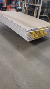 A large stack of drywall sheets ready for a remodeling project by Cleaning Solutions & Remodeling Services LLC in Shreveport, LA.