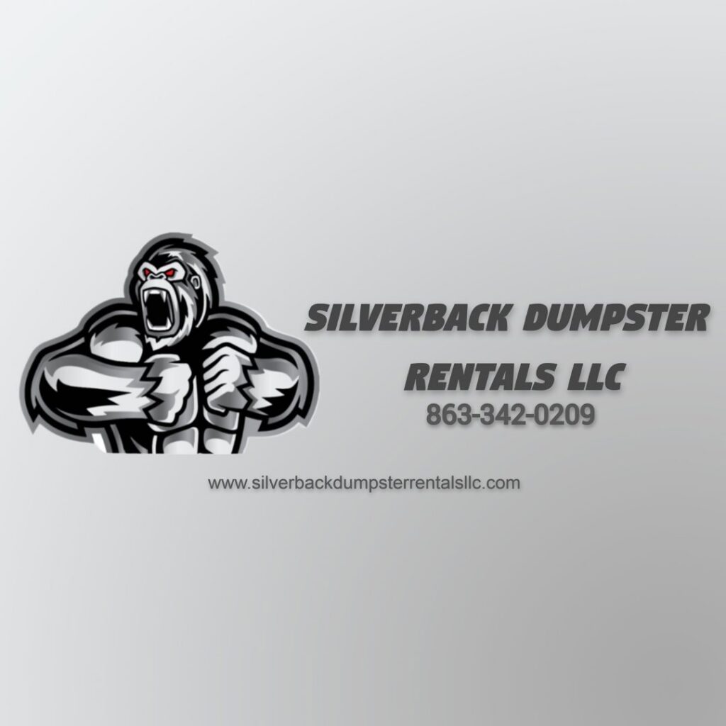 A Silverback Dumpster Rentals dump trailer actively dumping construction waste and debris at a site in LaBelle, FL.