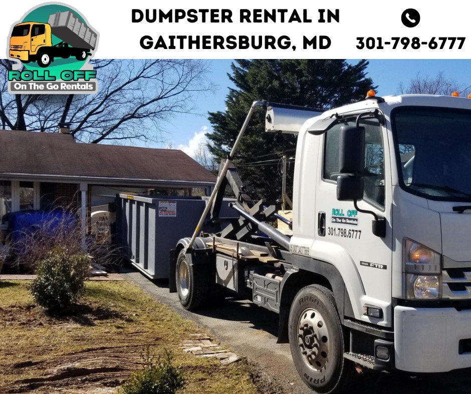 A roll-off dumpster being delivered to a residential driveway by Roll Off On the Go Rentals in Silver Spring, MD.