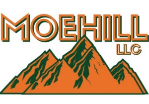 A large dumpster filled with various junk and debris after a cleanup job by Moehill Trashout in Toledo, OH.