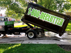 A 1-800-Declutter truck with a large dumpster, ready for junk removal services in Cincinnati, OH.