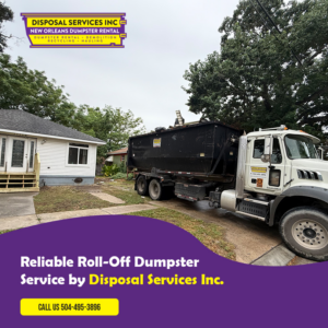 A roll-off dumpster on a truck parked in front of a residential house by Disposal Services Inc. in New Orleans, LA
